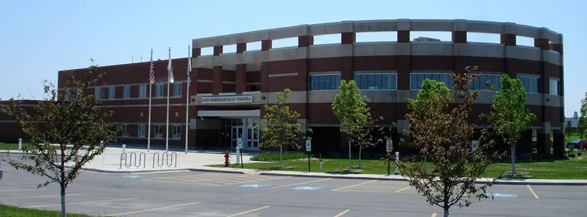 Modern community center with landscaped surroundings.